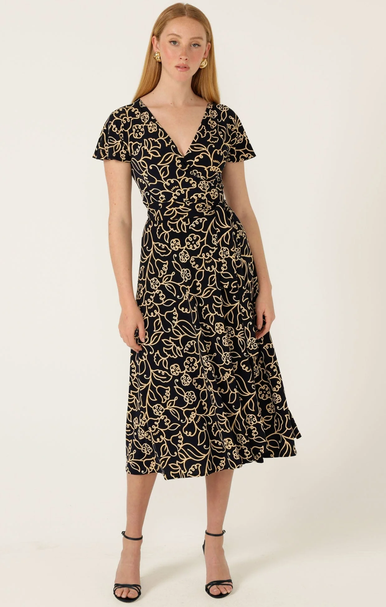 REVERSE WRAP MIDI DRESS IN NAVY GOLD FLOWER - Image 3