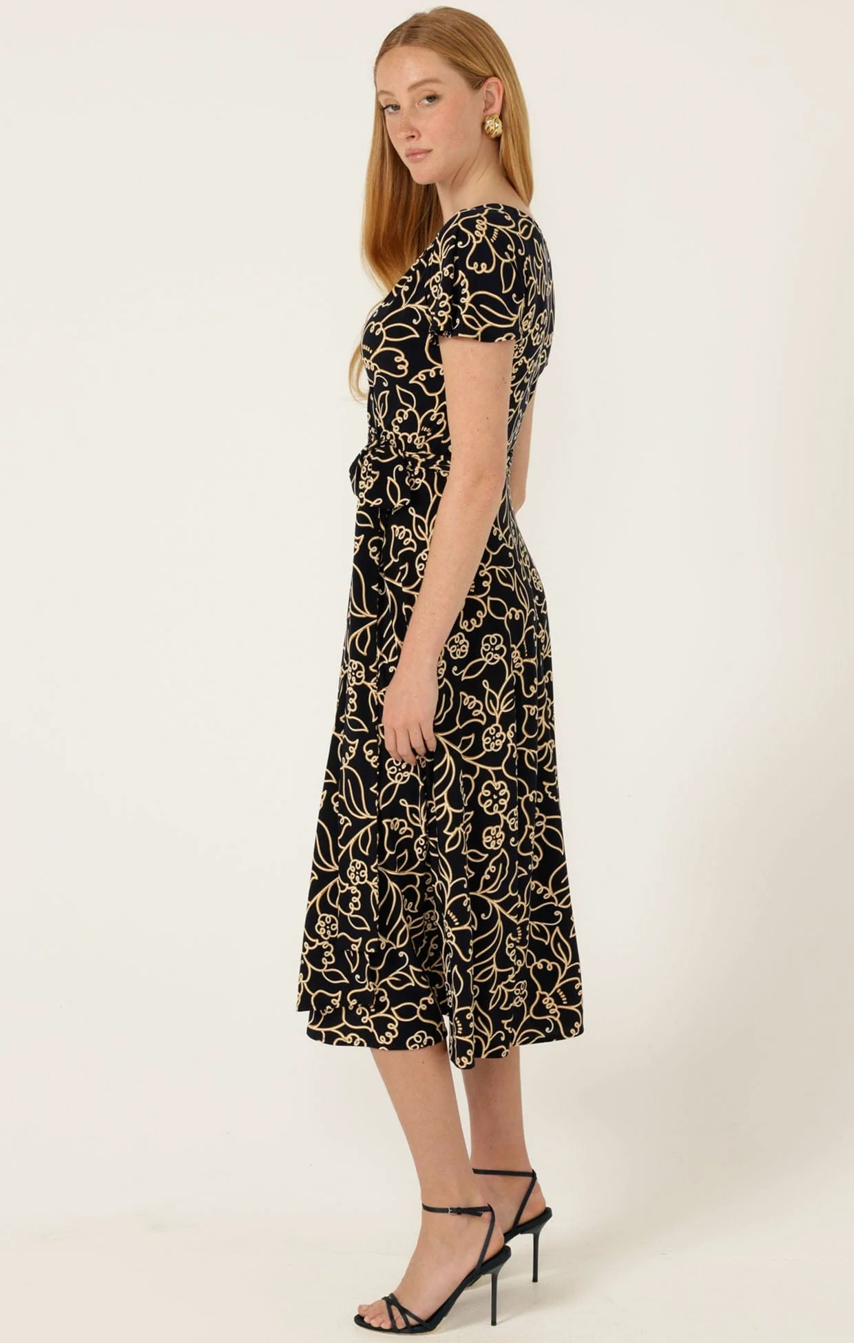 REVERSE WRAP MIDI DRESS IN NAVY GOLD FLOWER - Image 4